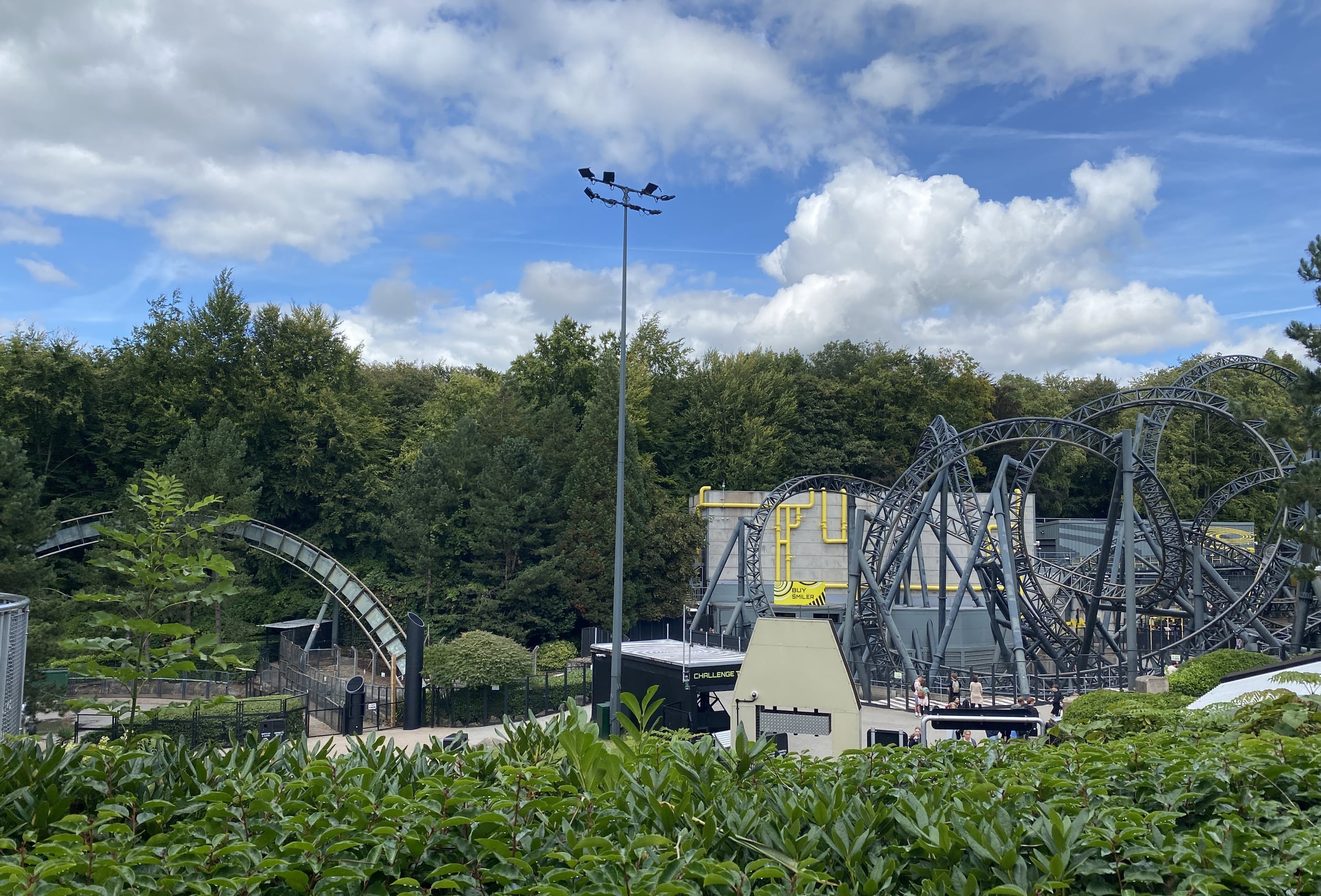 Oblivion and The Smiler rollercoasters among trees at Alton Towers