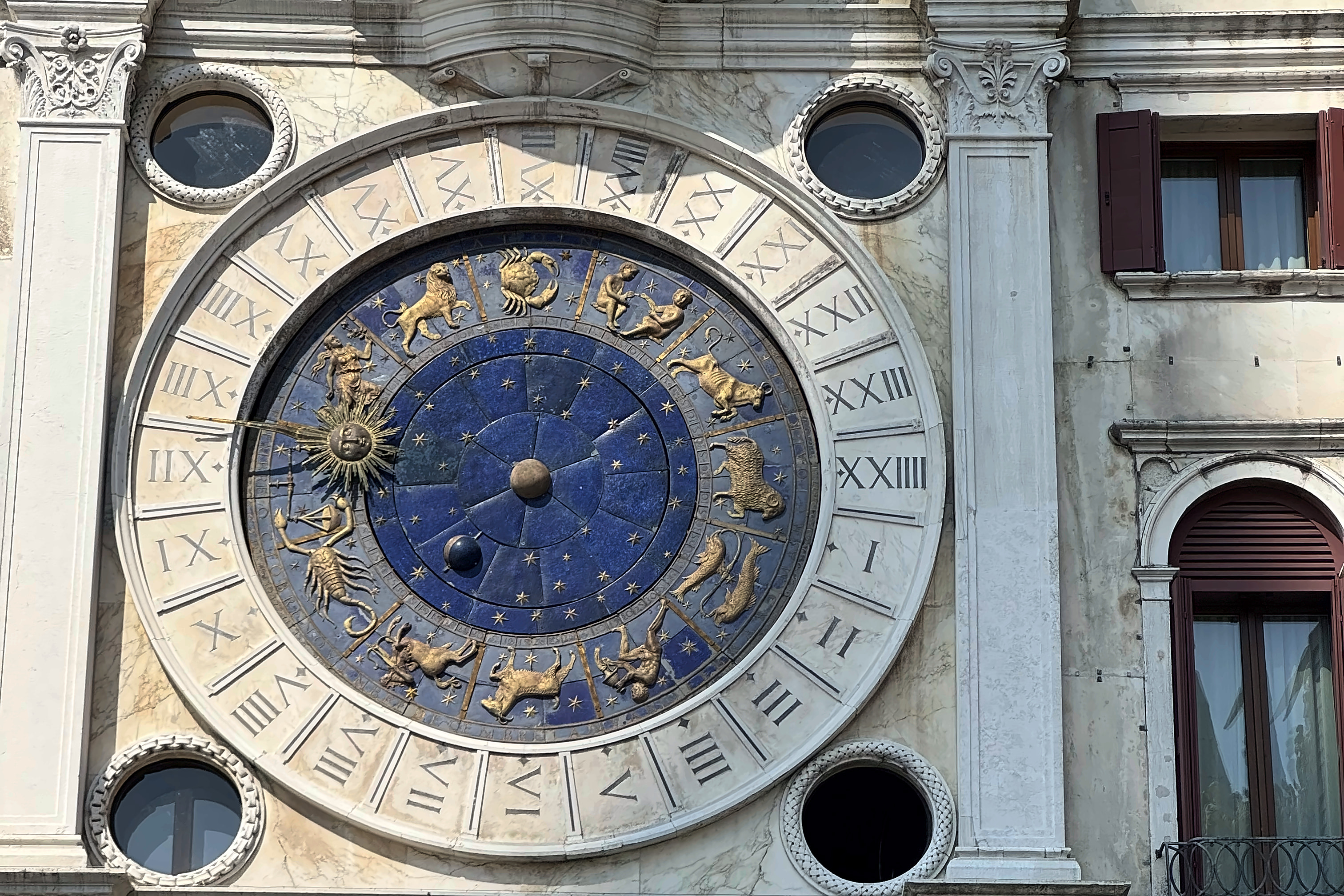 The blue and gold zodiac dial of the Torre dell'Orologio in St Mark's Square